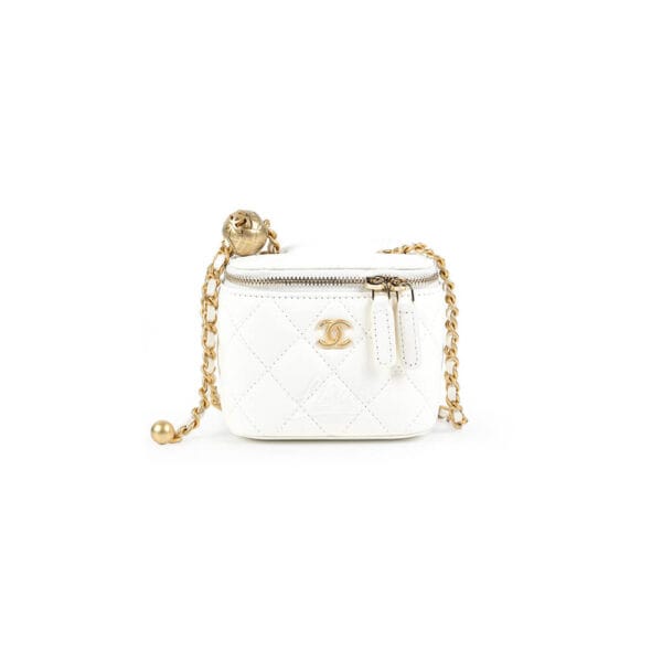 Chanel small gold ball makeup bag Beige